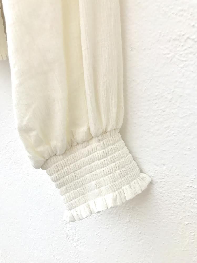 manga de bámbula blanca con puño elástico